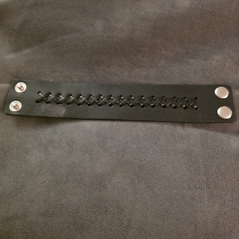 Black Faux Leather Bracelet with Snap Closure.
